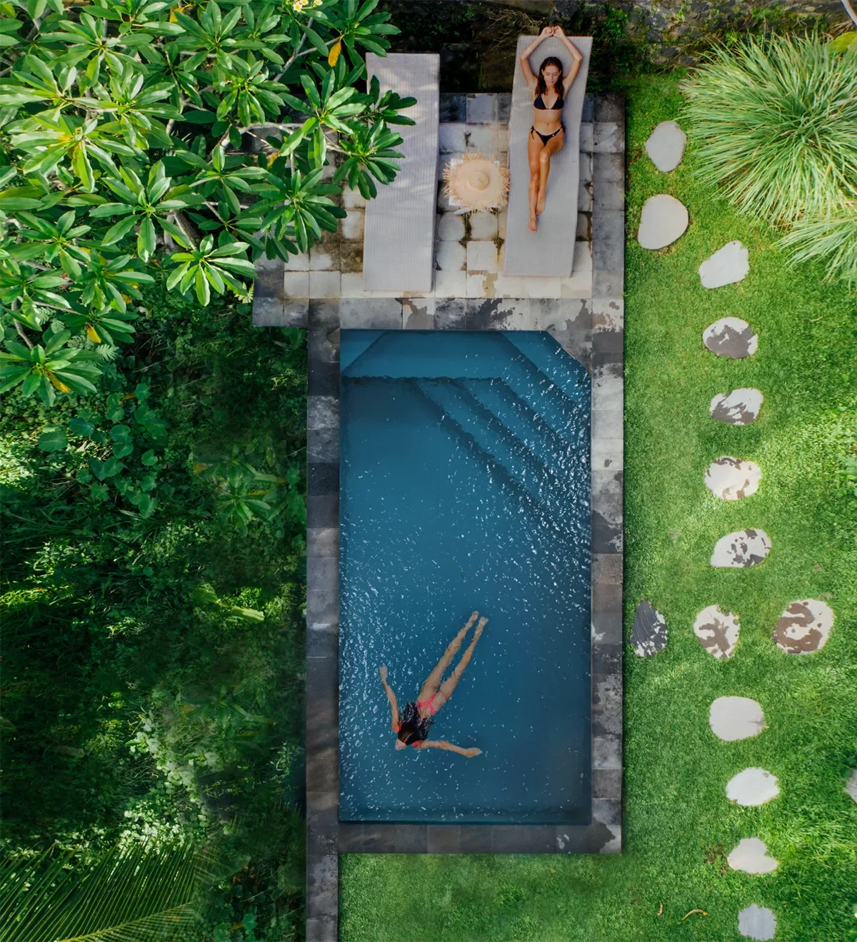 Aerial view of installed VESSEL pool integrated with wood decking